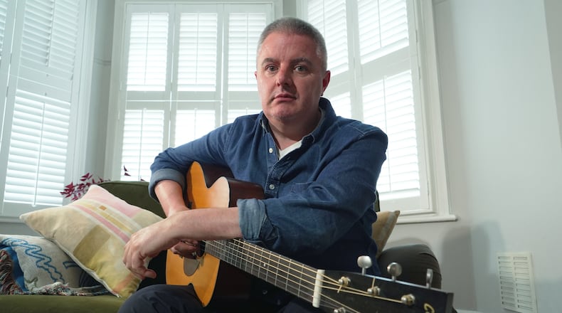 Musician Samuel Smith poses for a photo at his home, in London, Tuesday, May 12, 2026. (AP Photo/Mustakim Hasnath)