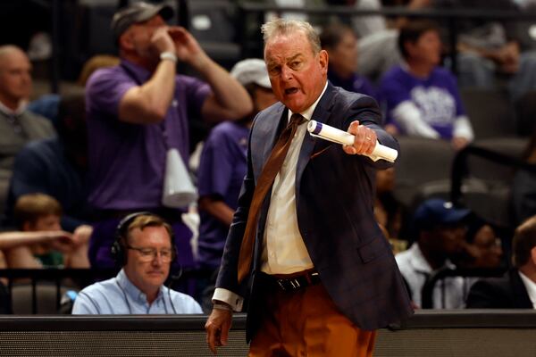 Texas head coach Vic Schaefer reacts after a call during the first half against TCU in the Elite Eight of the NCAA college basketball tournament Monday, March 31, 2025, in Birmingham, Ala. (AP Photo/Butch Dill)