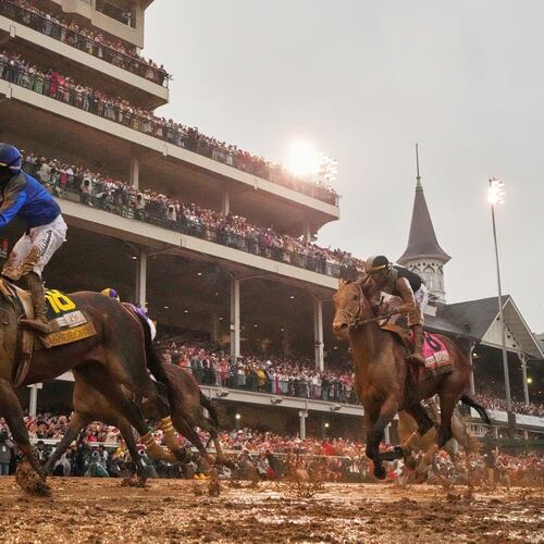 FILE - Sovereignty, ridden by Junior Alvarado, left, crosses the finish line to win the 151st running of the Kentucky Derby horse race followed by Journalism, ridden by Umberto Rispoli, May 3, 2025, at Churchill Downs in Louisville, Ky. (AP Photo/Abbie Parr, File)