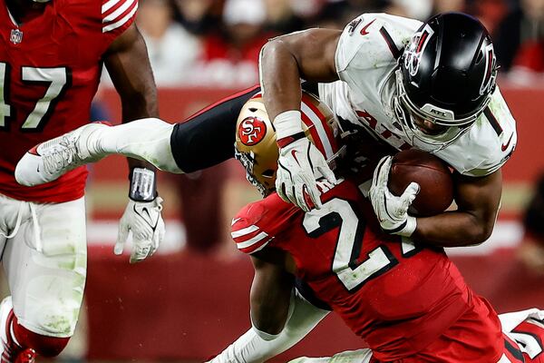 Falcons running back Bijan Robinson gets tackled against the 49ers.