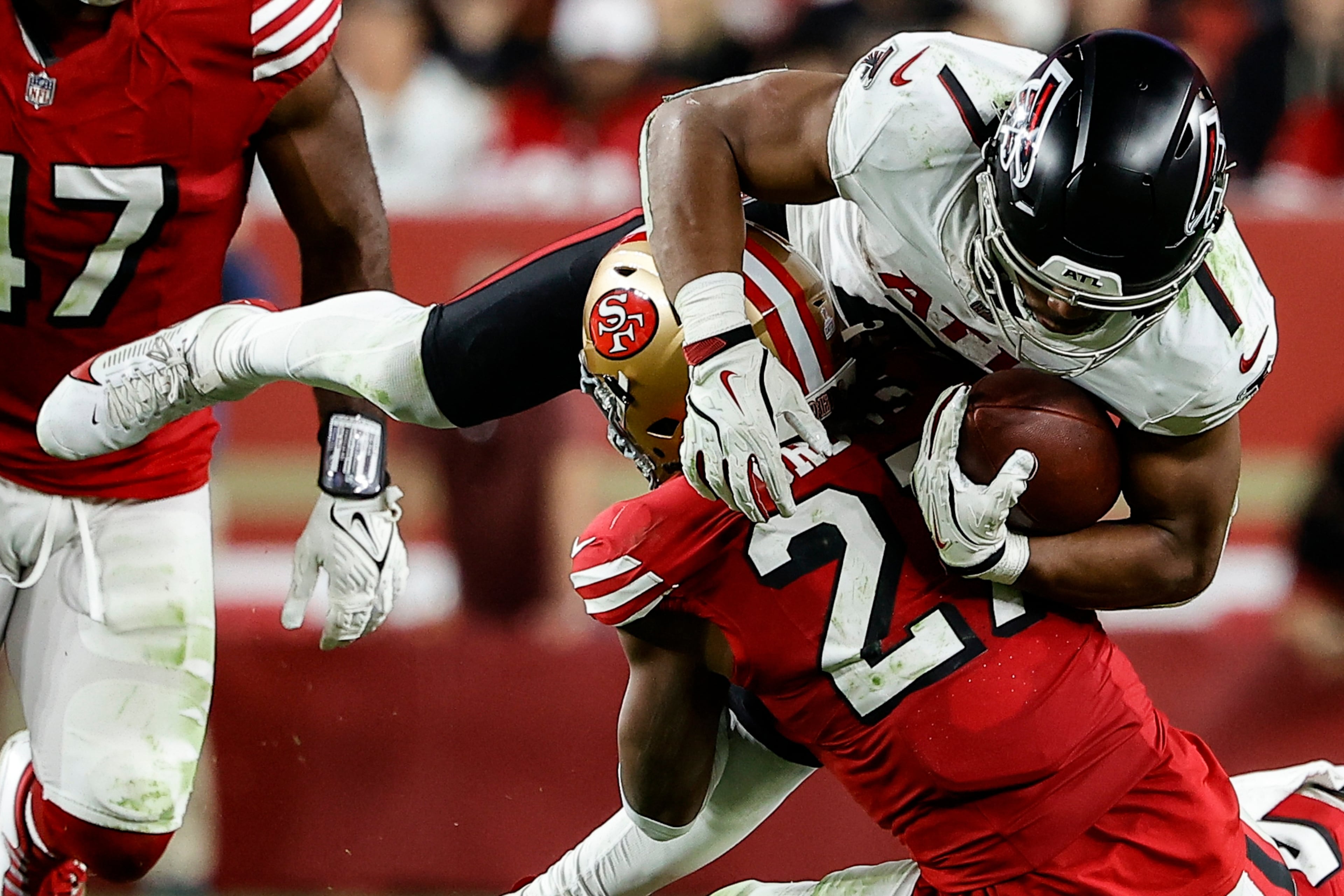 San Francisco 49ers safety Ji'Ayir Brown tackles Atlanta Falcons running back Bijan Robinson during the second half on Sunday, Oct. 19, 2025, in Santa Clara, Calif. (Kelley L Cox/AP)
