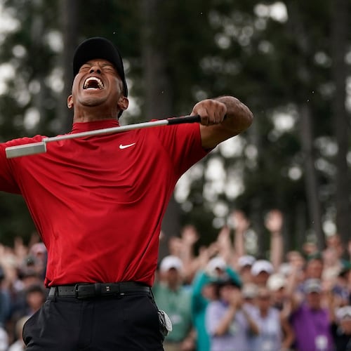 FILE - Tiger Woods reacts as he wins the Masters golf tournament, Sunday, April 14, 2019, in Augusta, Ga. (AP Photo/David J. Phillip, File)
