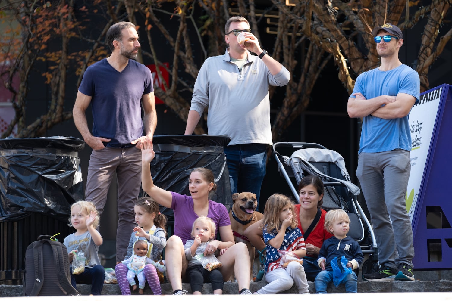 People watch the Georgia Veterans Day Parade in Midtown Atlanta on Saturday, Nov. 8, 2025.   Ben Gray for the Atlanta Journal-Constitution