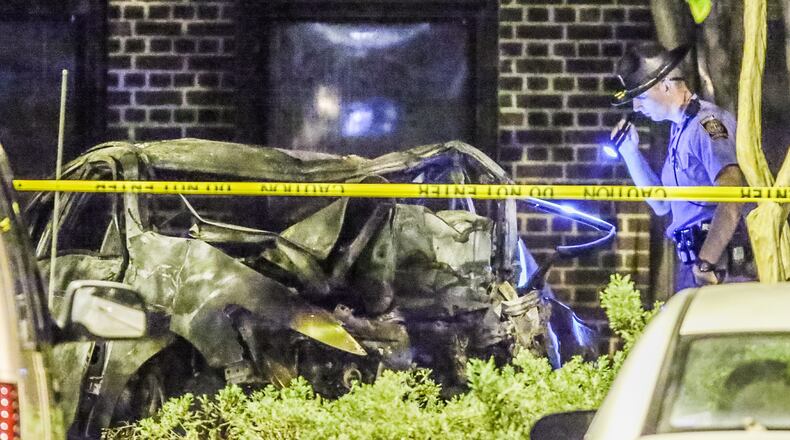 The Georgia State Patrol is investigating a fatal car crash and fire at Georgia Tech’s ROTC building. JOHN SPINK / JSPINK@AJC.COM