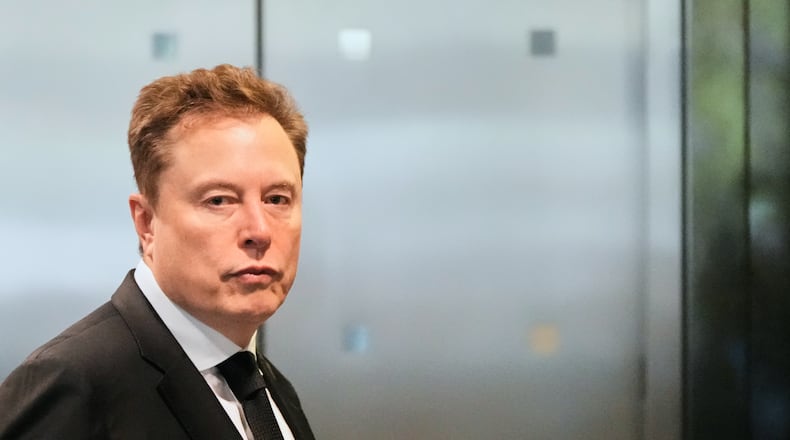 Elon Musk arrives at the U.S. District Court in Oakland, Calif., Tuesday, April 28, 2026. (AP Photo/Godofredo A. Vásquez)