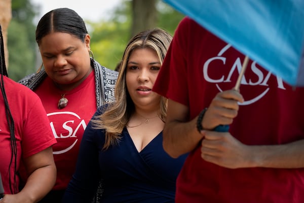 Jennifer Vasquez Sura, center, the wife of Kilmar Abrego Garcia, arrives at the U.S. District Court in Greenbelt, Md., Monday, July 7, 2025. (AP Photo/Mark Schiefelbein)