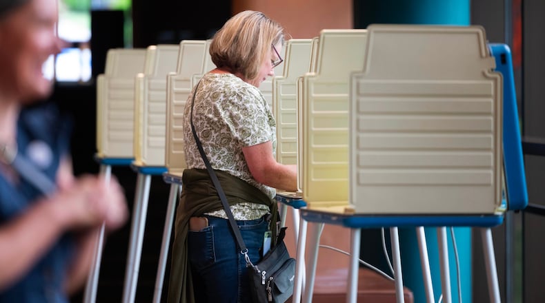 Megan Green fills out her ballot in the Nebraska Primary Election at Omaha Community Playhouse Tuesday, May 12, 2026, in Omaha, Neb. (AP Photo/Rebecca S. Gratz)
