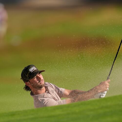 Ryder Cowan hits from the bunker on the second hole during the first round of the U.S. Open golf tournament at Shinnecock Hills Golf Club in Southampton, N.Y., Thursday, June 18, 2026.(AP Photo/David J. Phillip)