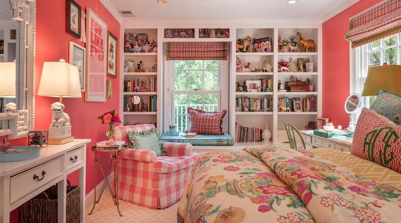 The wall of built-in bookcases hosts the things Annabelle holds dear, from her childhood to today: collections of horse figures and dolls, books, travel mementos and framed snapshots celebrating life s special moments. (Bob Greenspan/TNS)