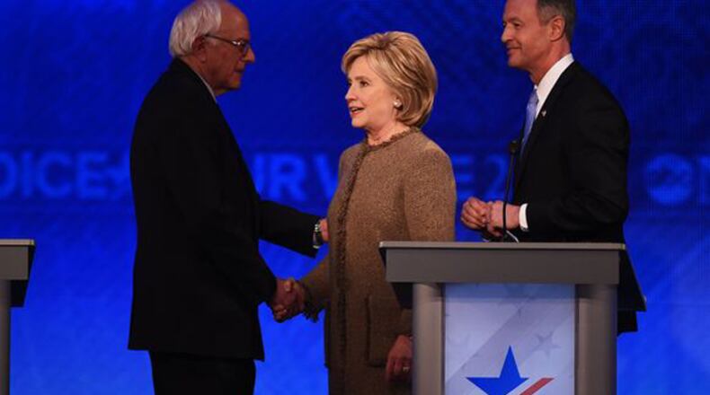 Bernie Sanders, Hillary Clinton and Martin O'Malley appear on stage at a Democratic debate in Manchester, N.H., on Dec. 19, 2015.