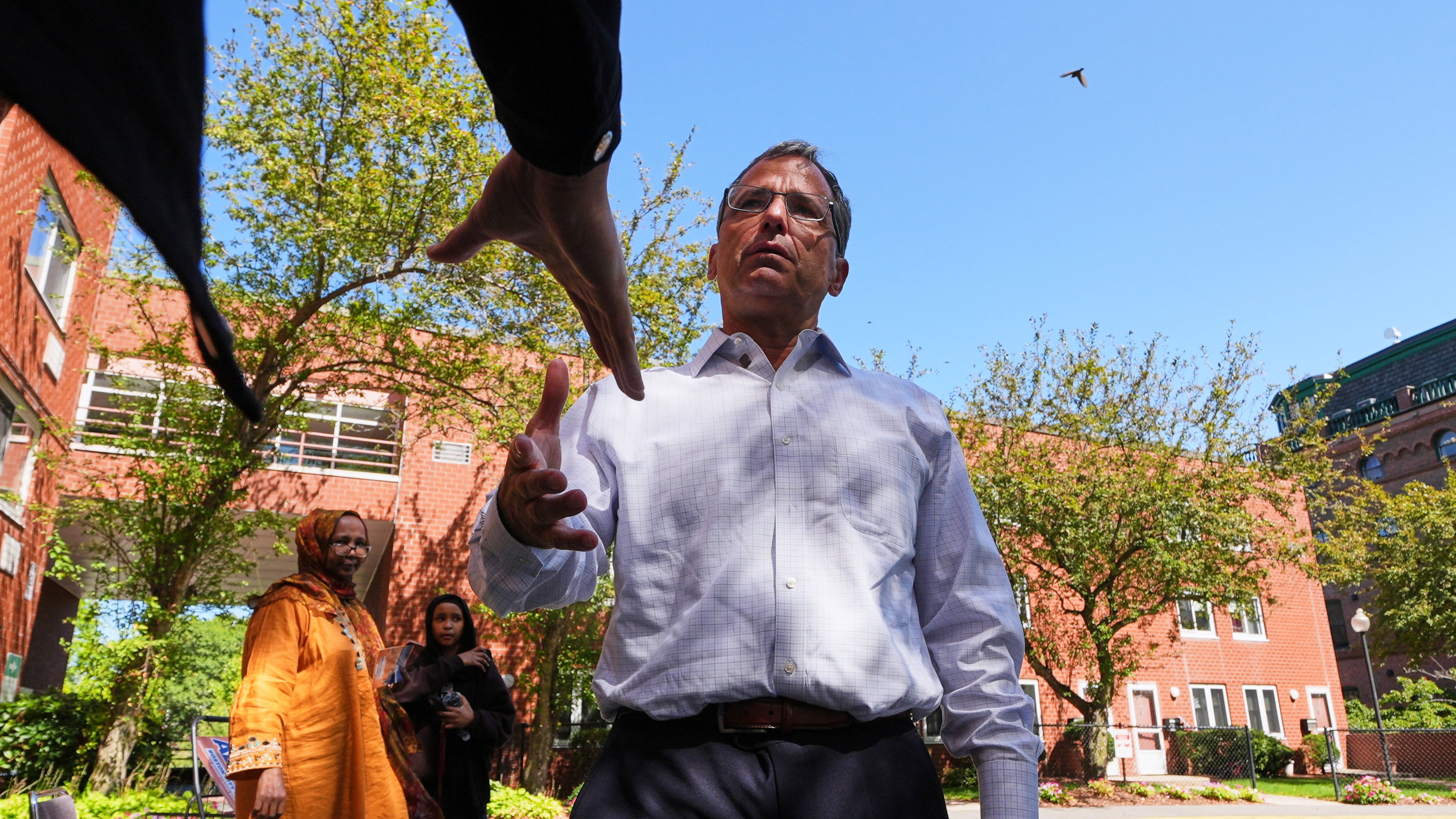 Boston mayoral candidate Josh Kraft campaigns outside a polling place, Tuesday, Sept. 9, 2025, in the Roxbury neighborhood of Boston. (AP Photo/Charles Krupa)