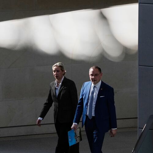 FILE - AfD Co-leaders Alice Weidel, left, and Tino Chrupalla attend a session of the German parliament in Berlin, Germany, March 18, 2026. (AP Photo/Markus Schreiber, File)