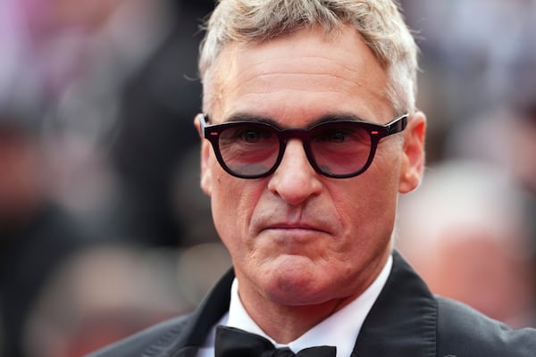 Joaquin Phoenix poses for photographers upon arrival at the premiere of the film 'Eddington' at the 78th international film festival, Cannes, southern France, Friday, May 16, 2025. (Photo by Scott A Garfitt/Invision/AP)
