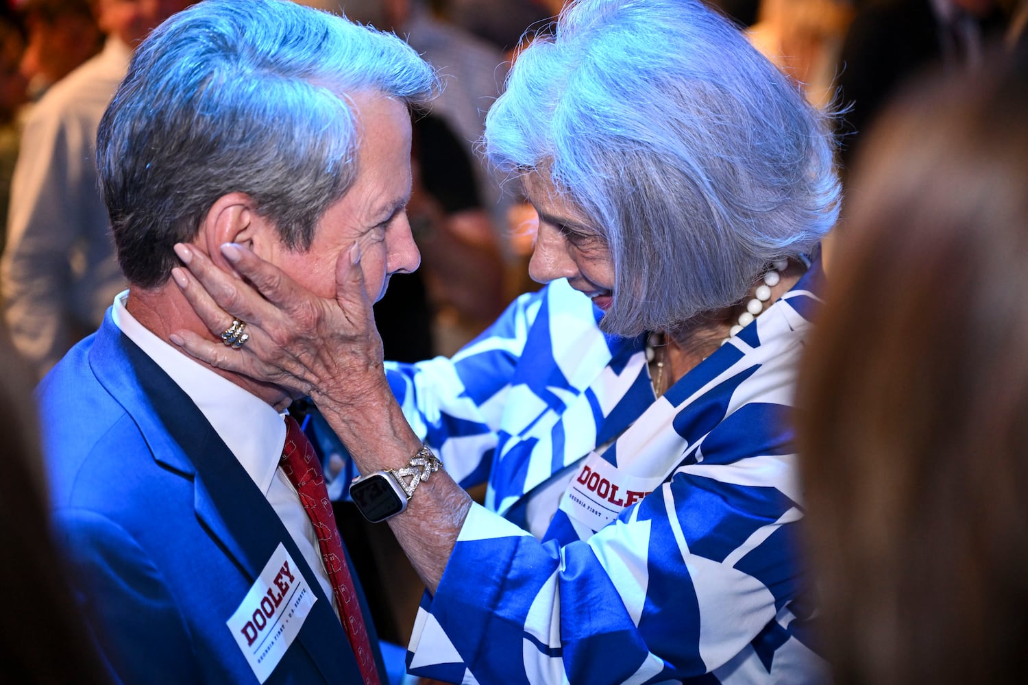 Gov. Brian Kemp greets Georgia GOP gubernatorial candidate Derek Dooley’s mother, Barbara Dooley, at her son's election night party at Park Bench at the Battery during the 2026 Georgia primary elections Tuesday, May 19, 2026, in Atlanta. (Daniel Varnado for the AJC)
