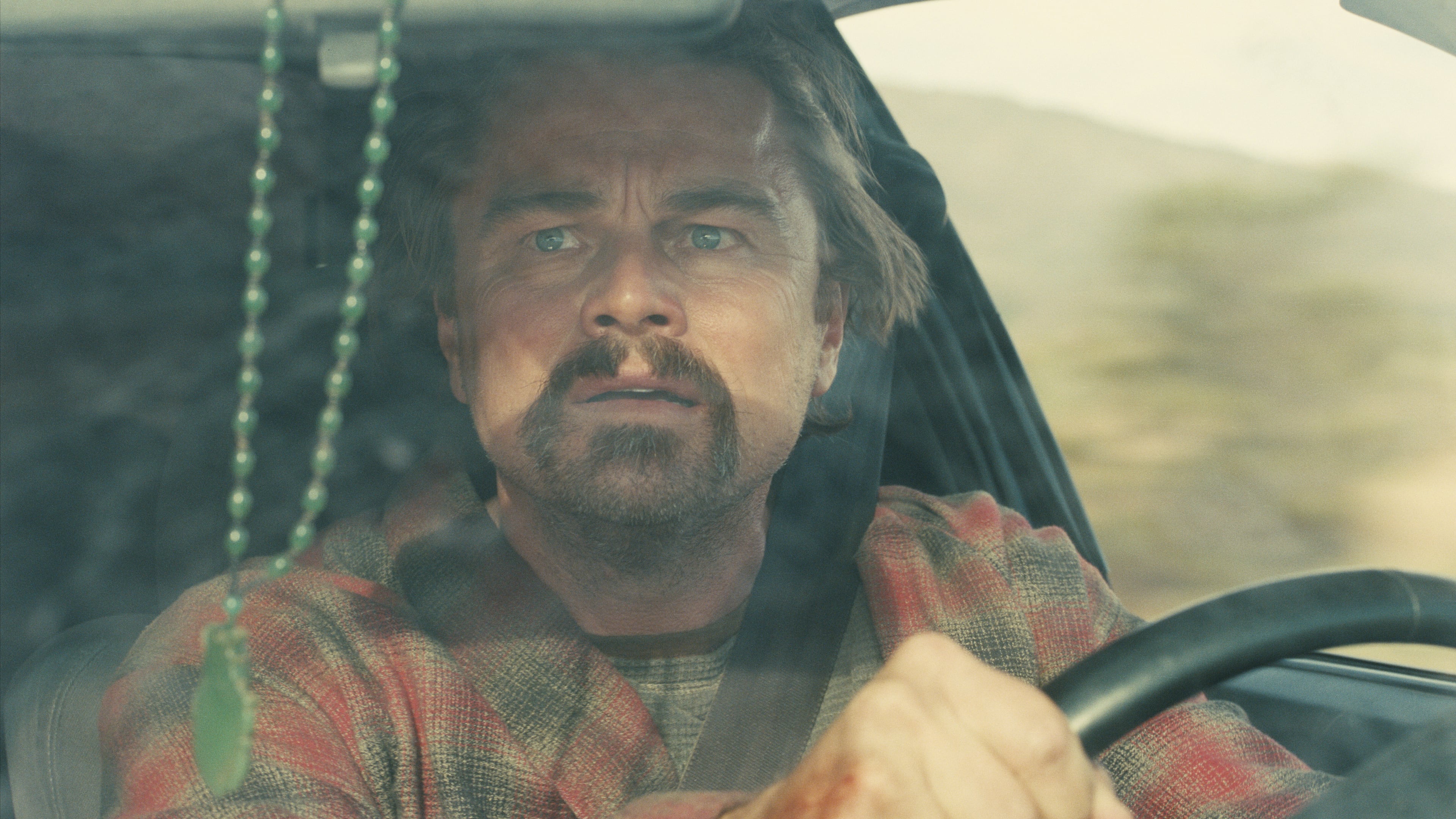 This image released by Warner Bros. Pictures shows Leonardo DiCaprio in a scene from "One Battle After Another." (Warner Bros. Pictures via AP)