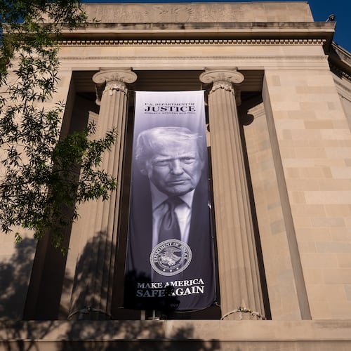 FILE - A portrait of President Donald Trump is displayed at the Justice Department building in Washington, June 2, 2026. (AP Photo/J. Scott Applewhite, File)
