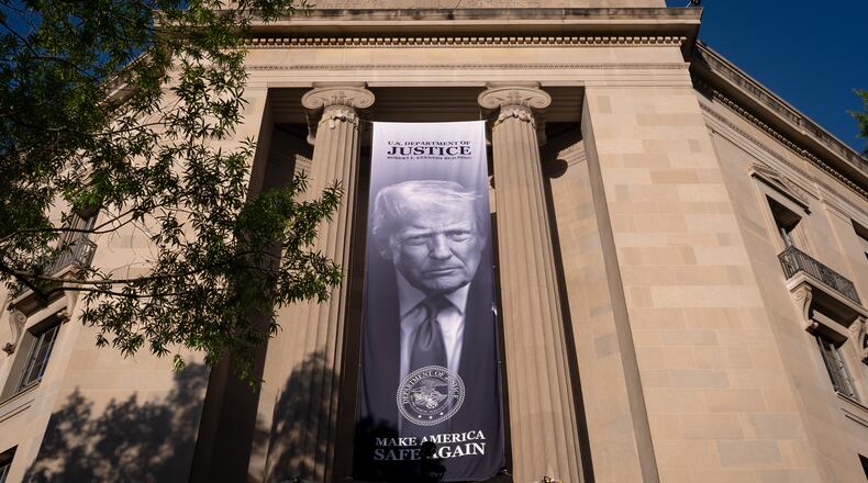 FILE - A portrait of President Donald Trump is displayed at the Justice Department building in Washington, June 2, 2026. (AP Photo/J. Scott Applewhite, File)