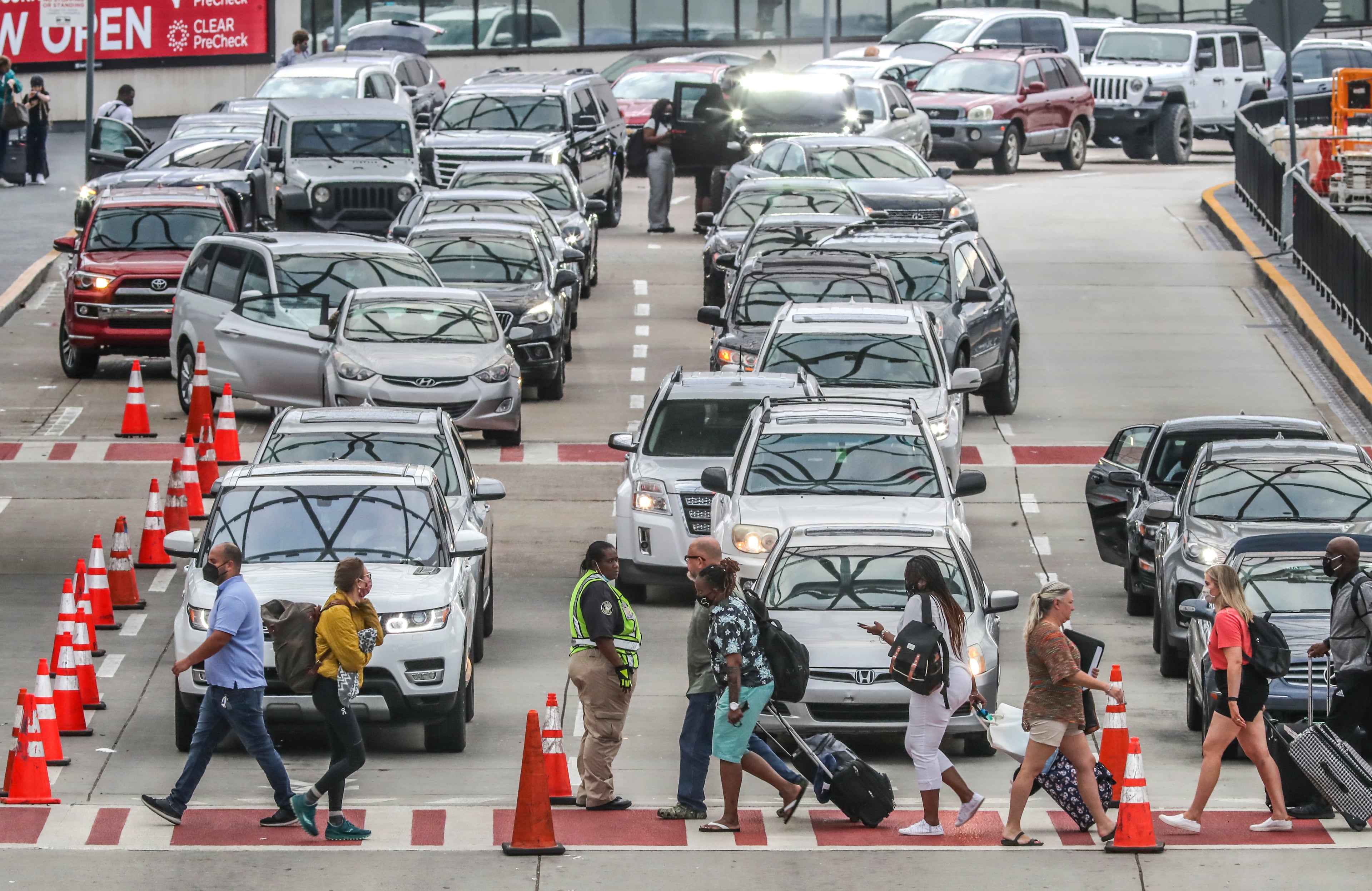 The South Domestic Terminal was jammed with cars and passengers as crowds have returned to Atlanta's Hartsfield-Jackson International Airport for the Memorial Day weekend travel period as seen in 2021. (John Spink / AJC file)