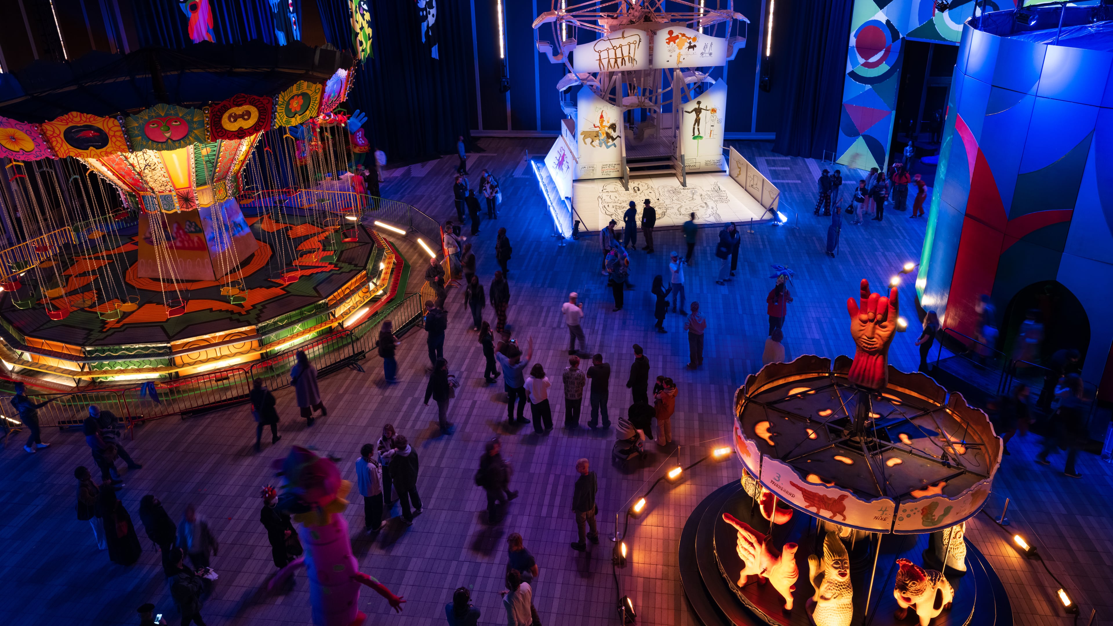 Luna Luna is a colorful, immersive carnival featuring rides painted by, or conceptualized by, renowned artists, including Jean-Michel Basquiat, Salvador Dalí, Keith Haring and Roy Lichtenstein. (Courtesy of Brian Ferry/Luna Luna).