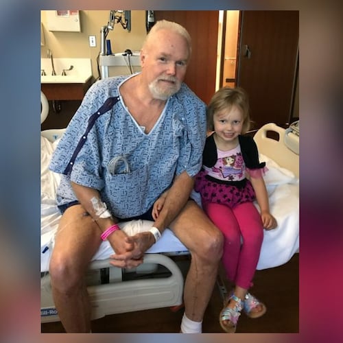 Ronald Yarbrough is visited in hospital by his granddaughter, Roxanne Hachat, while recovering from a heart attack in 2019. His widow Glenda filed a lawsuit after his death. (Courtesy of Glenda Yarbrough via attorney Lloyd Bell)