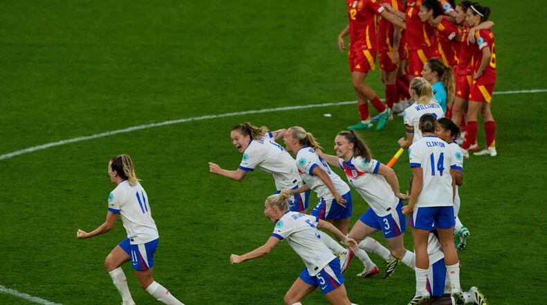 FILE - England players celebrate after winning the Women's Euro 2025 final soccer match between England and Spain at St. Jakob-Park in Basel, Switzerland, Sunday, July 27, 2025. (AP Photo/Michael Probst, File)