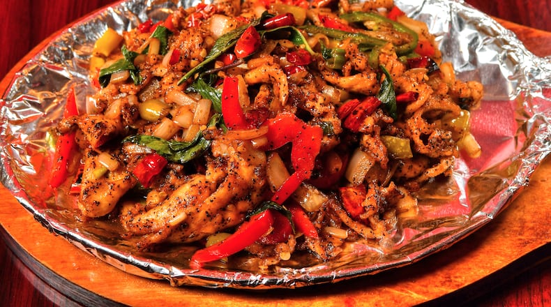 Sho Spicy’s Chicken with Three Peppers.
(Chris Hunt for The Atlanta Journal-Constitution