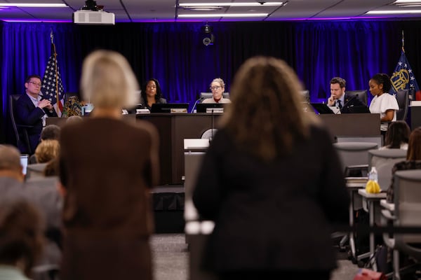 Board of Commissioners of DeKalb County listens to Joy Monroe, right, founder/CEO of SPARC (Single Parent Alliance & Resource Center) and community advocate Sue Sullivan during their presentation of findings on families living in extended-stay hotels on Tuesday, Jan. 6, 2026.
  (Miguel Martinez/AJC)