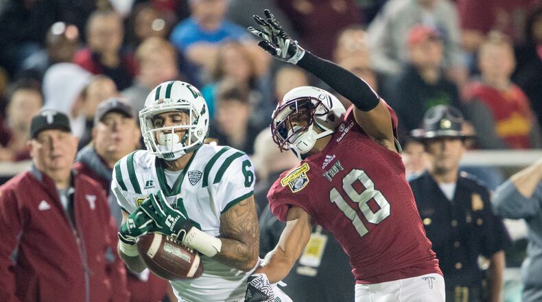 Wide receiver Sebastian Smith #6 of the Ohio Bobcats attempts to catch a pass in front of cornerback Blace Brown #18 of the Troy Trojans on December 23, 2016 in Mobile, Alabama. (Dec. 22, 2016 - Source: Michael Chang/Getty Images North America)