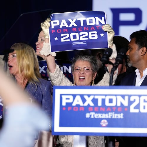 Attendees celebrate after Texas Attorney General Ken Paxton, a Republican candidate for the U.S. Senate, won the Republican party's nomination during a primary runoff election night event Tuesday, May 26, 2026, in Plano, Texas. (AP Photo/Tony Gutierrez)