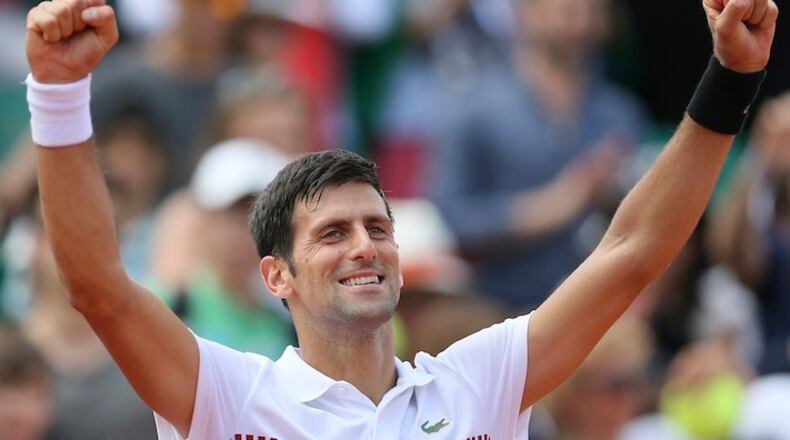 FILE - In this May 31, 2017, file photo, Serbia's Novak Djokovic celebrates after defeating Portugal's Joao Sousa during their second round match of the French Open tennis tournament at the Roland Garros Stadium, in Paris. Novak Djokovic has won three Wimbledon titles and normally would be considered a real likely candidate for a fourth, but he has not played up to his usual standards over the past year. (AP Photo/David Vincent, File)