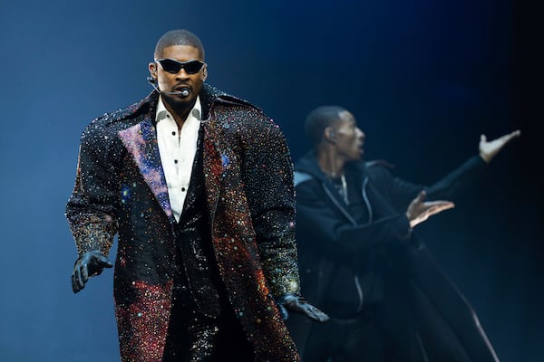 Usher performs on stage at the O2 Arena in London, March 29, 2025. (Photo by Scott A Garfitt/Invision/AP)
