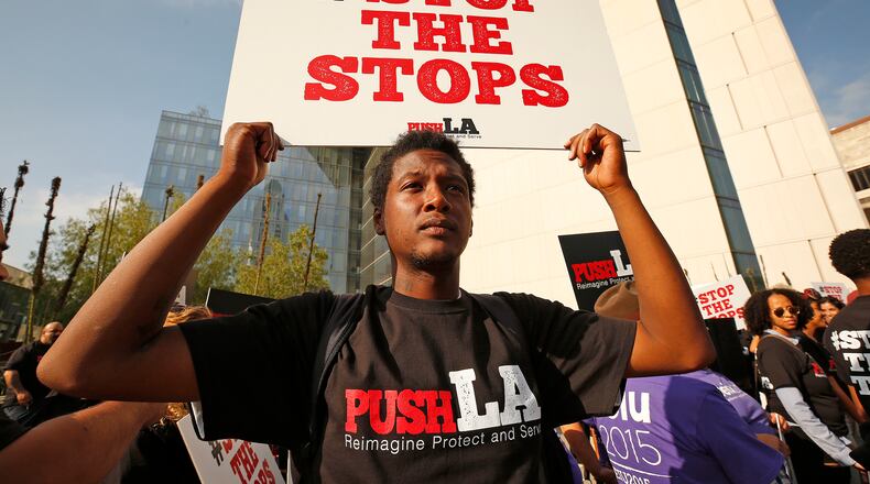 A protester with Community Coalition calling for police reform in Los Angeles in October 2019. (Al Seib/Los Angeles Times/TNS)