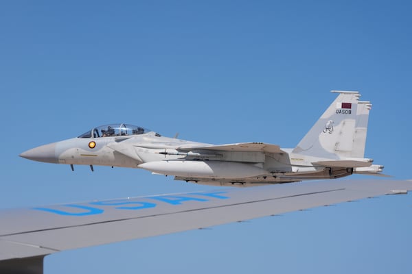 Qatar Emiri Air Force F-15s provide an honorary escort for Air Force One, carrying President Donald Trump, as it arrives in Doha, Qatar, Wednesday, May 14, 2025. (AP Photo/Alex Brandon)
