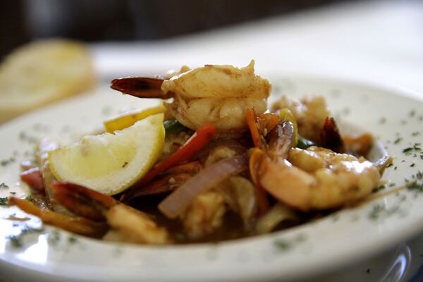 FILE - A classic serving of shrimp creole is served at Cafe Dauphine in New Orleans, Wednesday, Aug. 26, 2015. (AP Photo/Gerald Herbert, File)