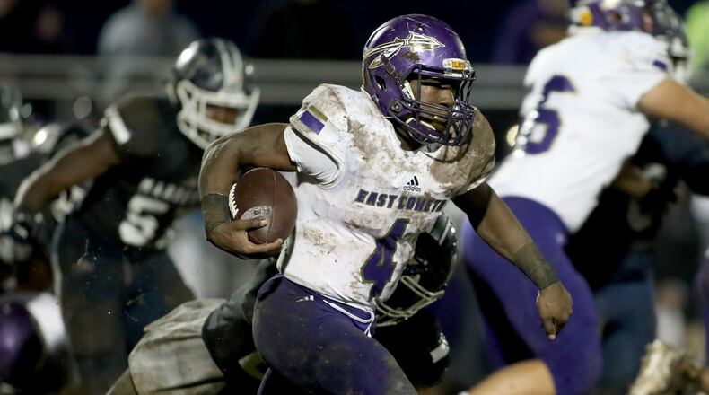 East Coweta's Gerald Green runs for a touchdown during the first half of the Indians' 2018 Class 7A first-round playoff game victory over Marietta. (Jason Getz/Special)