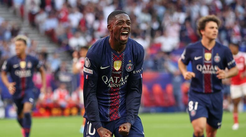 PSG's Ousmane Dembele celebrates after scoring from a penalty kick during the Champions League final soccer match between Paris Saint-Germain and Arsenal in Budapest, Hungary, Saturday, May 30, 2026. AP Photo/Armin Durgut)