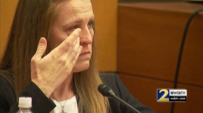 Massage therapist Annie Anderson tears up while reading a text message that she sent to Diane McIver in the hours before she died. (Channel 2 Action News)