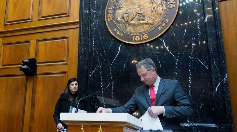 FILE - Indiana Republican House Speaker Todd Huston leaves the podium in the house chamber at the Statehouse, Jan. 8, 2024, in Indianapolis. (AP Photo/Darron Cummings, File)