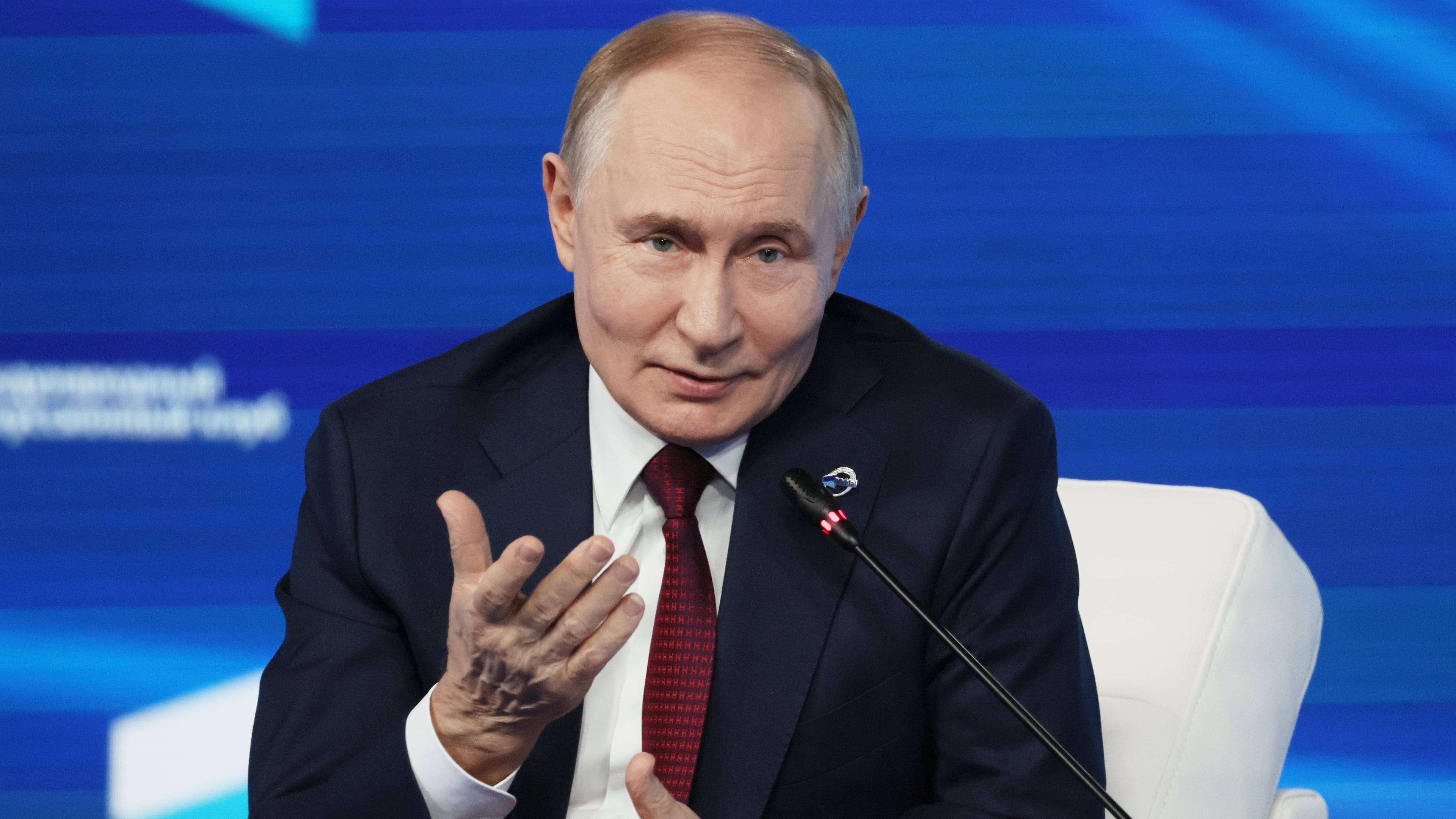 Russian President Vladimir Putin gestures as he answers questions during a meeting with foreign policy experts at the Valdai Discussion Club in the Black Sea resort of Sochi, Russia, on Thursday, Oct. 2, 2025. (Mikhail Metzel, Sputnik, Kremlin Pool Photo via AP)