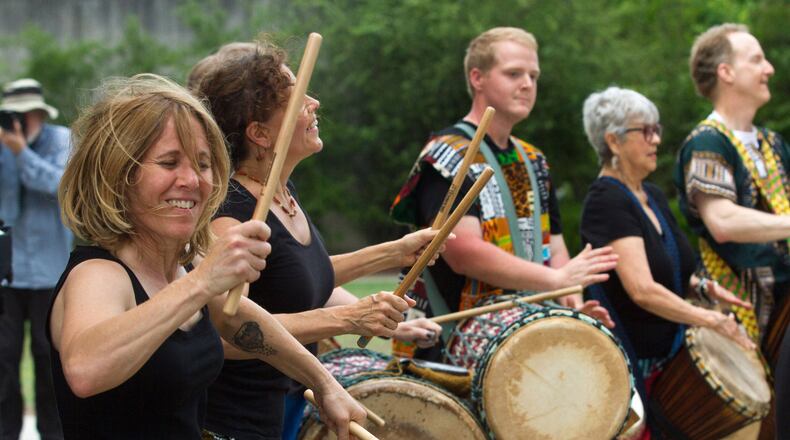 The Sehwe Village Percussion ensemble plays during the Decatur Arts Festival in downtown Decatur. STEVE SCHAEFER / SPECIAL TO THE AJC