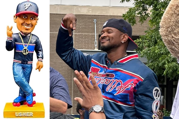 Usher comes by the Braves-Mets game to celebrate his bobblehead and throw out a first pitch as well as ceremonially "open the gates" to fans on Wednesday, June 18, 2025. (Atlanta Braves, Rodney Ho/AJC)