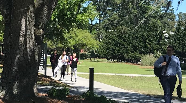 Students walk across the Georgia Southern University campus in Savannah on Tuesday, April 16, 2019. The Georgia Board of Regents held the first of a two-day meeting there to vote on tuition and fees for Georgia Southern and the 25 other schools in the University System of Georgia. ERIC STIRGUS / ESTIRGUS@AJC.COM.