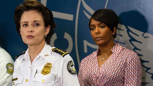 Atlanta Police Chief Erika Shields talks at a press conference while Mayor Keisha Lance Bottoms looks on. (STEVE SCHAEFER for The Atlanta Journal-Constitution)