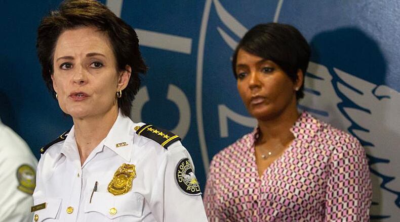 Atlanta Police Chief Erika Shields talks at a press conference while Mayor Keisha Lance Bottoms looks on. STEVE SCHAEFER FOR THE ATLANTA JOURNAL-CONSTITUTION