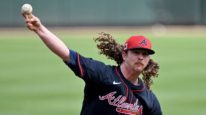 Atlanta Braves pitcher Grant Holmes throws a live batting practice session during the first full-squad spring training workouts at CoolToday Park, Tuesday, February 18, 2025, North Port, Florida. (Hyosub Shin / AJC)