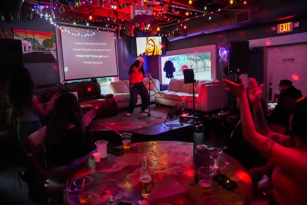 Oye Fest hosts karaoke night at 97 Estoria. (Olivia Bowdoin for the AJC)