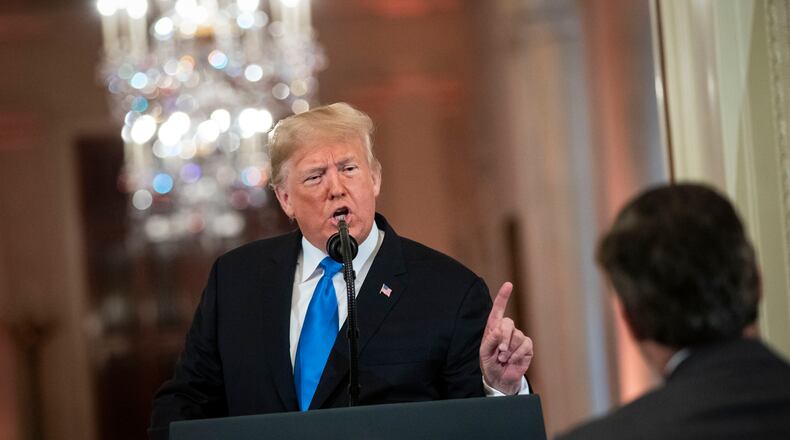 WASHINGTON, DC - NOVEMBER 07: (AFP OUT) U.S. President Donald Trump gets into an exchange with CNN reporter Jim Acosta during a news conference a day after the midterm elections on November 7, 2018 in the East Room of the White House in Washington, DC. Republicans kept the Senate majority but lost control of the House to the Democrats. (Photo by Al Drago - Pool/Getty Images)