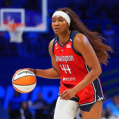 FILE - Washington Mystics forward Kiki Iriafen dribbles during the first half of a WNBA basketball game against the Dallas Wings in Arlington, Texas, May 18, 2026. (AP Photo/LM Otero, File)