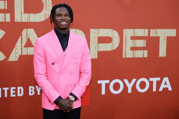 Colorado wide receiver Travis Hunter poses on the carpet before first round of the NFL football draft, Thursday, April 24, 2025, in Green Bay, Wis. (AP Photo/Matt Ludtke)