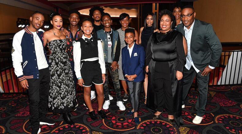 The Oct. 3 Atlanta screening of “The Hate U Give” brought out the film’s stars, as well as Mayor Keisha Lance Bottoms (back, center), author Angie Thomas (third from right) and director George Tillman Jr. (right). PARAS GRIFFIN / GETTY IMAGES